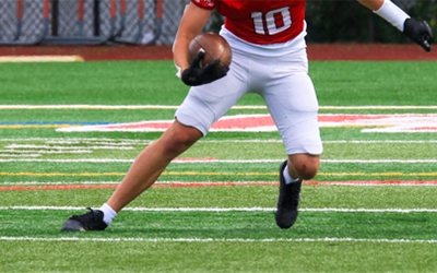 Does Playing Surface Matter? Turf vs. Grass and Groin Injury Risk in Football