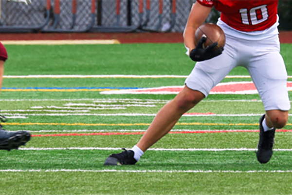 Does Playing Surface Matter? Turf vs. Grass and Groin Injury Risk in Football