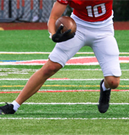 Does Playing Surface Matter? Turf vs. Grass and Groin Injury Risk in Football